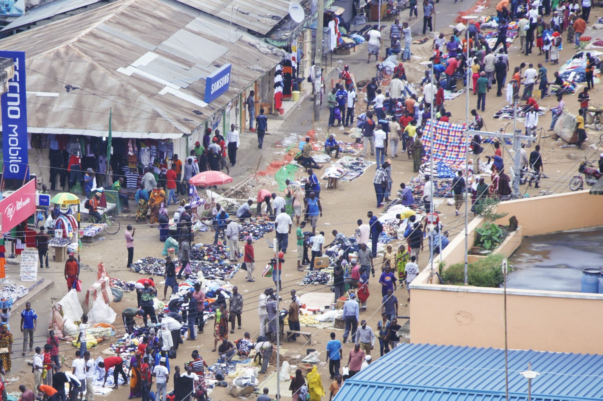 Aerial view of crowds and stalls at Kariakoo market, Dar es Salaam